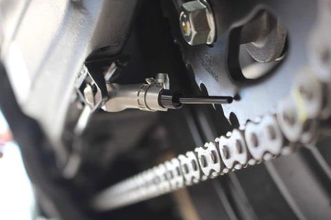 Vsystem Automatic Motorcycle Chain Lubrication System Easy Fit installed on chain, enhancing maintenance and extending sprocket life