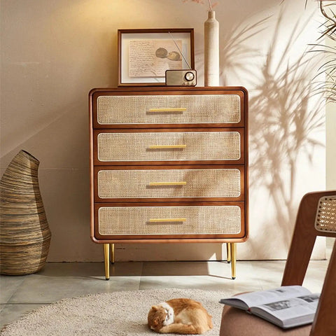 Wooden dresser with golden handles, light decorative items and sunlight streaming, featuring woven texture and 3 inch solid brass cabinet pulls.