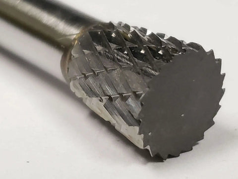 SN 2 Inverted Cone Carbide Burr With Double Cut For Metalworking, Three Eighths Inch Shank, shown in close-up from an angle.