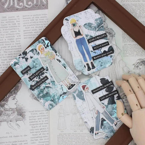 ATC Cards Die Set For Scrapbooking And DIY Card Making displayed with stencils and embellishments on a decorative background.
