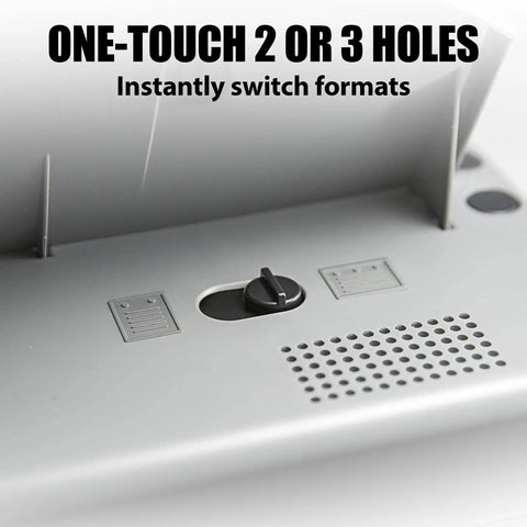 Close-up of Electric Desktop 2 To 3 Hole Punch With 30 Sheet Capacity. Gray selector switch for easy hole format change.
