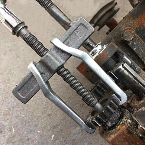 14 Inch Two Jaw Gear Puller Set With Adjustable Chrome Vanadium Steel Construction in use for gear removal