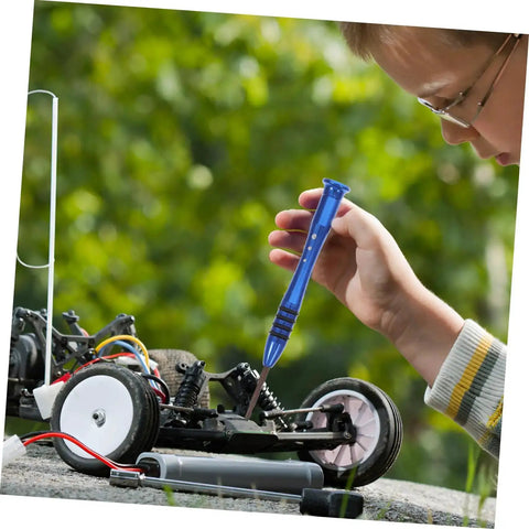 Child repairing RC car with Must Have RC Car Maintenance Kit With Full Screw Set Nuts Bolts And Hardware Fasteners Including Metric Screws