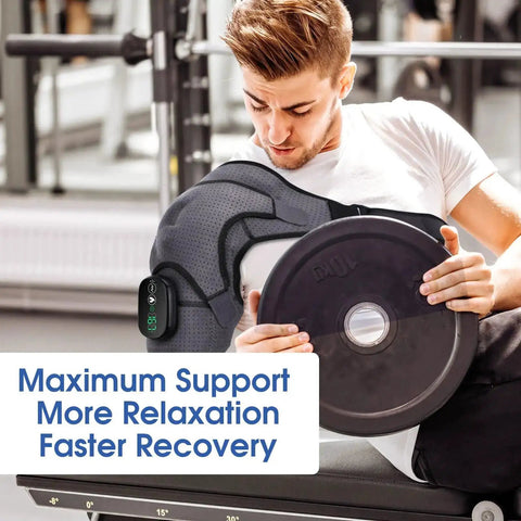 Man using Cordless Shoulder Heating Pad With Vibration Massage Wireless Heated Shoulder Wrap for pain relief during gym session.