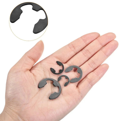 External Retaining Rings 30 Pack 5.25mm E Clip Snap Rings held on hand, showing 65Mn carbon steel, burr-free smooth finish