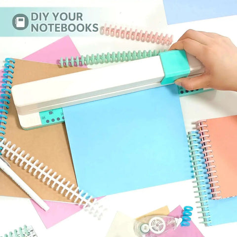 Hand using Workhorse 30 Hole Binding Machine With Spiral Binding System Makes It Easy To Create Custom Notebooks And Planners on paper