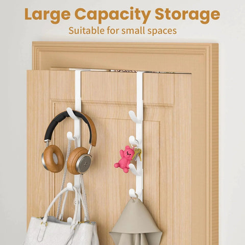 White metal over-the-door hooks on wooden door organizing headphones, bags, and accessories, ideal for bathroom closet use, two-pack