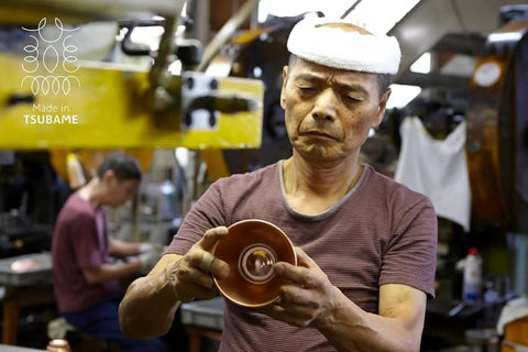 Artisan crafting a component for Tsubame WDS185 Stainless Steel Coffee Dripper, showcasing precision in Japanese manufacturing.