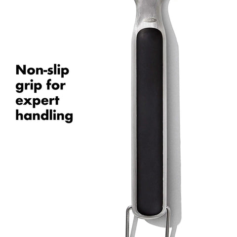 Close-up of Grilling Tool Precision Turner with a black non-slip grip handle and stainless steel, OXO Good Grips Black.