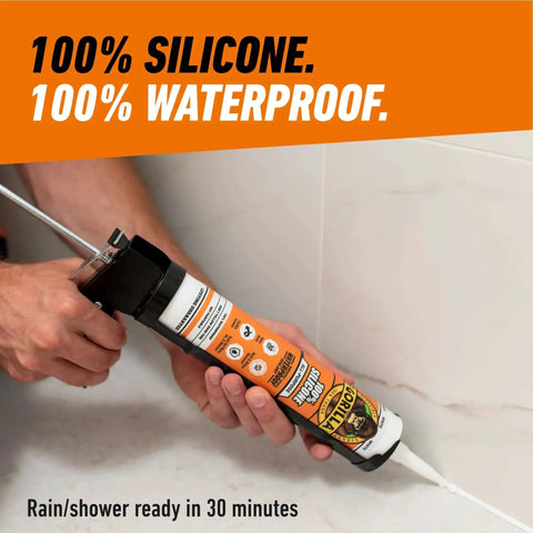 Person applying All Purpose Silicone Sealant Waterproof Indoor Outdoor 30 Minute Cure White 10Oz to bathroom tile joint