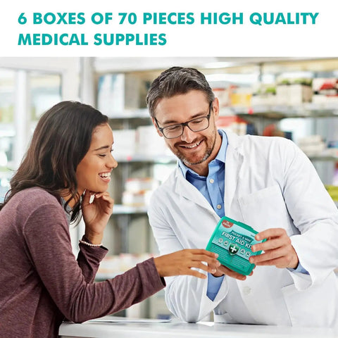 Pharmacist showing customer the Ultimate 420 Piece First Aid Kit With Six Ready To Go Boxes containing 70 essentials each.