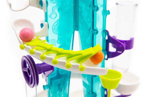 Thames and Kosmos Gumball Machine Maker toy with translucent blue frame and neon-yellow track, purple wheel