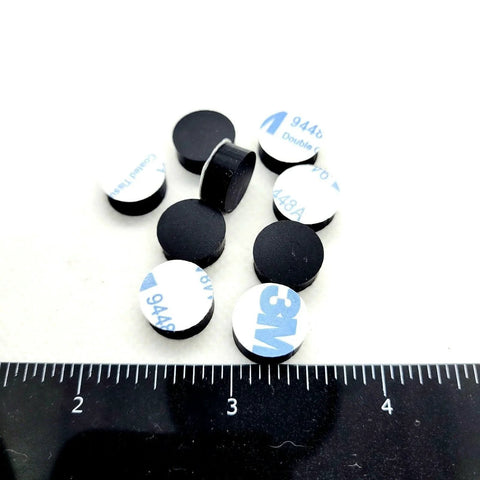 Image of One Half Inch Round Silicone Rubber Bumper Feet Three Sixteenths Of An Inch Thick Adhesive Backed Spacer Pads next to a ruler
