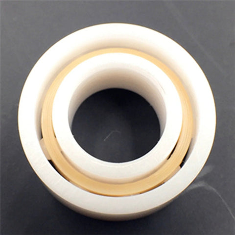 R188 full ceramic ball bearing, 1/4 in x 1/2 in x 3/16 in, white outer race with gold inner ring.