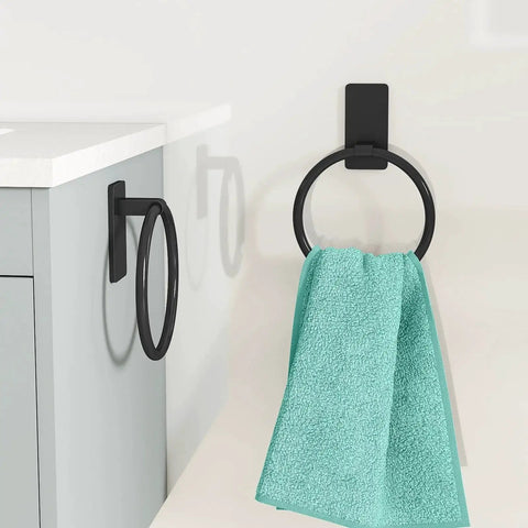 Adhesive Towel Ring For Bathroom No Drilling Install Easy Mount Hand Towel Holder Stainless Steel Aluminum Rustproof Large Base 1.96 By 3.94 Inches Ideal For Home And RV installed on wall with towel.