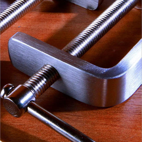 C-clamp, stainless steel tool for automotive repair and woodworking projects; heavy-duty welding clamp.