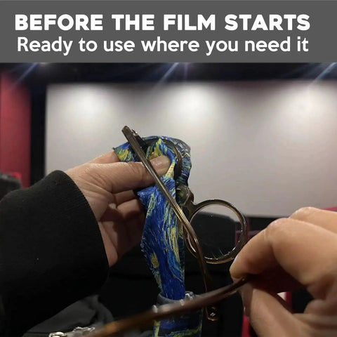 Using Microfiber Glasses Cleaning Cloths Set 4 Pack With Double Sided Art Design in a theater to clean eyewear