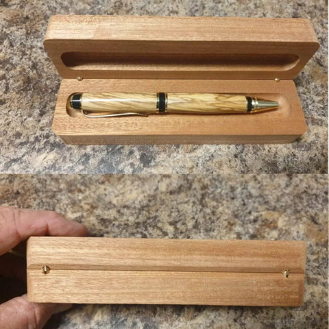 Wooden pen box with concealed brass barrel hinges, showcasing the sleek storage for a handcrafted pen
