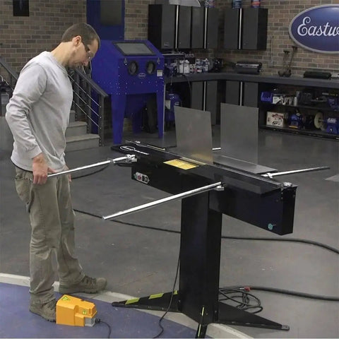 Man using 48 Inch Electro Sheet Metal Brake With 6 Ton Capacity, Magnetic Bender And Folding Tool, 220V Single Phase