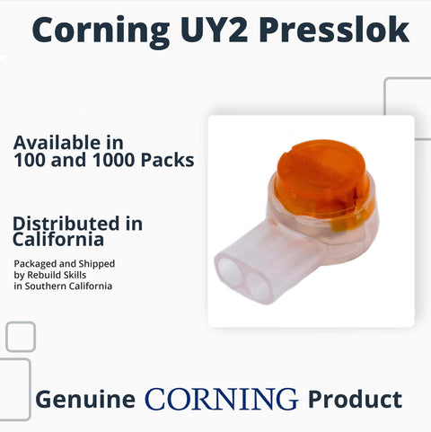 Corning UY2 Presslok splice connector with orange cap on clear plastic housing
