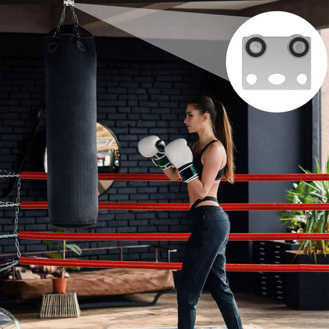 Boxing setup with punching bag and four wheel trolley assembly rollers with bearing for use with one and five eighths inch wide and taller strut channel.