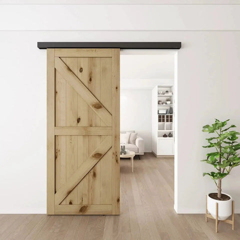 Six Foot Sliding Barn Door Hardware Track Kit Aluminum Box Rail Wall Mount Interior Wooden Doors Supports Up To 130 Lbs Suitable Door Thickness One And Three Eighths Inch To One And Three Quarters Inch Easy Installation With Comprehensive Manual showcasing a wooden door installed in a modern living space.