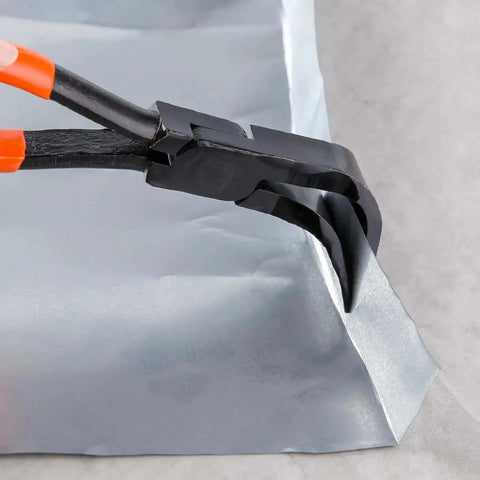 10 Inch Hand Seamer Workhorse for Sheet Metal Bending and Flattening, 90 Degree Jaws with PVC Handle, close-up on metal edge