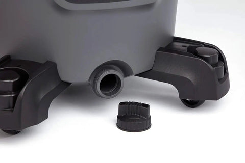 Close-up of the drainage port and wheels of 12 Gallon Wet Dry Shop Vacuum Workhorse With 5 Peak HP Motor, Dark Gray and Red