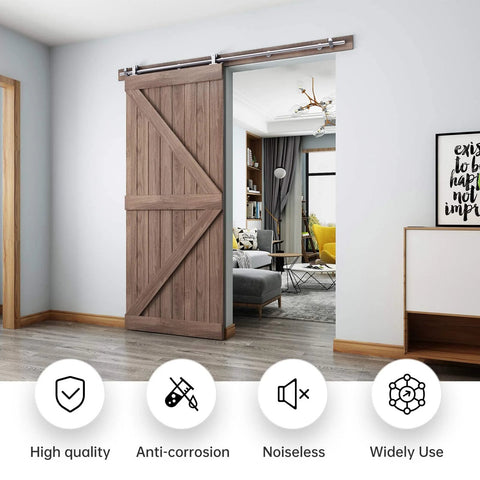 6.6 Foot Top Mount Stainless Steel Sliding Barn Door Hardware Track Kit That Slides Like Butter For 36 To 40 Inch Wide Single Doors Heavy Duty Anti Rust Smooth Quiet Ball Bearing Roller System Easy Install installed on wooden barn door in living room