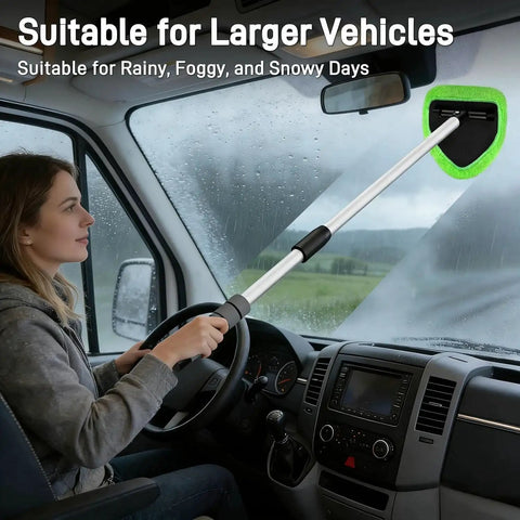 Woman using Long Reach Windshield Cleaner Tool with 180 Degree Pivot and Microfiber Pads inside a van on a rainy day