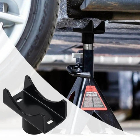 Heavy Duty Bottle Jack Adapter Saddle For Axle Tubes Fits Round 2 Inch, 3 Inch, 4 Inch And Square 2 Inch Axles With 1.5 Inch Lifting Platform, Rugged Lift Accessory Up To 17000 Lbs For Trucks, SUVs And Off Road attached to a jack under a vehicle, with close-up of black adapter.