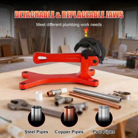 Red Alwalkee portable pipe vise with aluminum frame and detachable jaws; holds steel, copper, and PVC pipes.