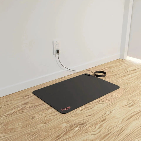 Grounding Mat For Wellness 24x16 Inch Conductive Carbon Pad With 15 Foot Cord Non Slip Rubber Backing on floor indoors