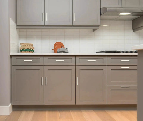 Gray kitchen cabinets with 25 Pack Solid 5 Inch Square Kitchen Cabinet Handles in Brushed Nickel Pulls for Cabinets and Drawers installed.
