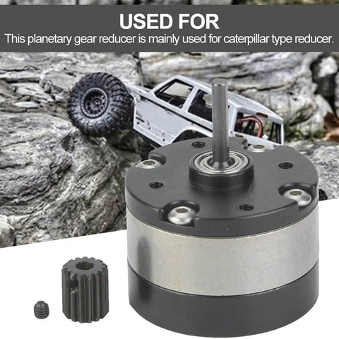 Planetary Gearbox Reduction Motor For RC Cars And Trucks on rocky terrain showcasing output shaft and all-metal gear.