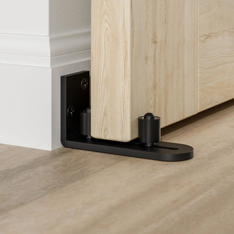 Sliding Barn Door Bottom Floor Guide with Wall Mounted Rollers, Adjustable Stay Roller and Ball Bearings, flat bottom design, black finish, heavy duty steel construction for smooth, quiet door operation.