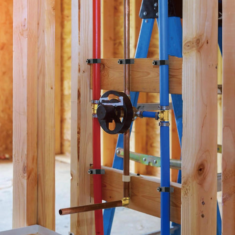 Black 1/2 in J-clamp tubing clips with screws for PEX, copper and CPVC pipes; multiple clips shown
