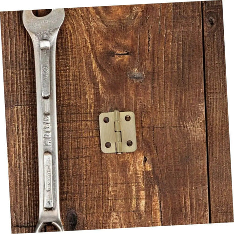 Mini Iron Hinges Hardware Kit With Screws For Wooden Jewelry Boxes And Small Cabinets, 270 Degree Rotation on wooden surface
