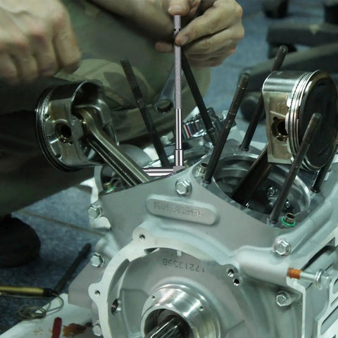 Person using Telescoping Gage Set Six Pack Stainless Steel Bore Gauges For Inside Diameter Measurement Range From Five Sixteenths To Six Inches Ideal For Precision Parts To Large Machinery A Versatile Measurement Tool For Machinists And Toolmakers on an engine component.
