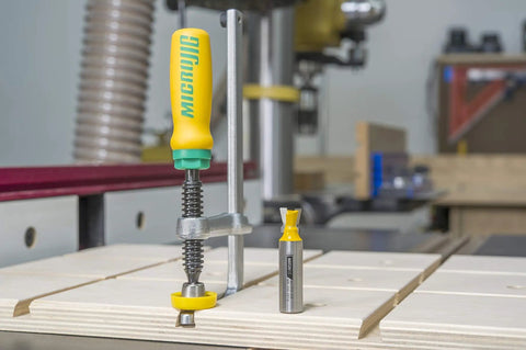 Matchfit Dovetail Clamp Pro Router Bit Kit With One Half Inch Shank And Fourteen Degree Bit For Precision Dovetail Routing In Woodworking Track System Includes Clamps Setup Gauge Hardware Pack And Manual on a wooden surface