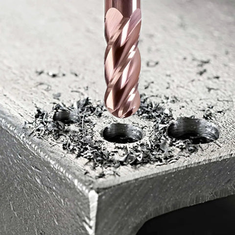 4 Flute TiSiN Coated Ball Nose End Mill 1/16 Inch Cutting Diameter drilling into metal surface