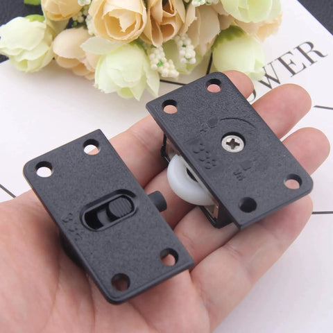 Black Nylon Sliding Door Rollers Replacement Kit With 4 Wheels, 16 Screws, durable metal and plastic, held in hand