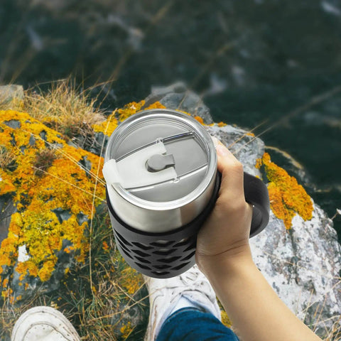 Durable Silicone Tumbler Sleeve With Handle For 20 Oz Cups No Slip Grip Insulated Protective Cover in use outdoors