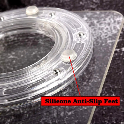 Close-up of Clear 6.4 Inch Square Acrylic Cookie Turntable with Non Slip Mat featuring silicone anti-slip feet for stability.
