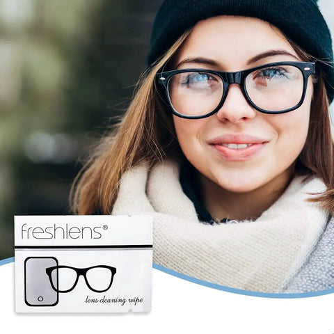 Woman wearing glasses with Freshlens Lint-Free Lens Wipes packaging, ideal for cleaning glasses and screens, pack of 50 pre-moistened towelettes.