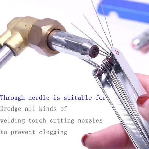 Close-up of Pro Grade Welding And Carb Cleaner Kit with 12 wire set cleaning a welding torch nozzle.