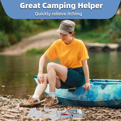Person using All Purpose Portable Emergency First Aid Kit With 135 Pieces For Home Car Travel Camping And Hiking by a lake