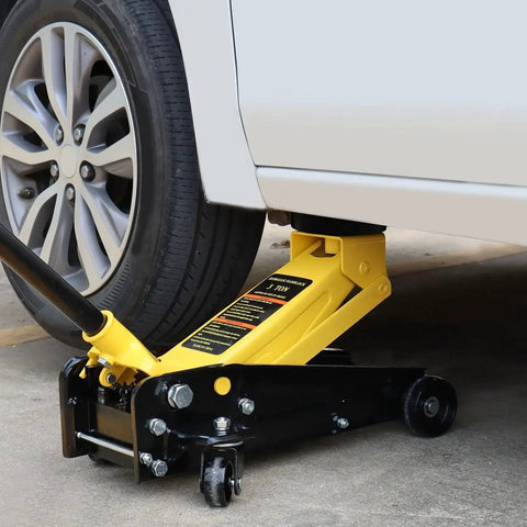 Floor Jack Pad Rubber Cushion Protector for Pinch Weld and Frame Rail being used on a car to protect chassis and paint.
