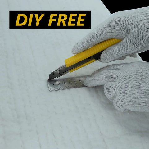 BACLAUGH ceramic fiber insulation blanket cut with yellow utility knife by gloved hand on a ruler