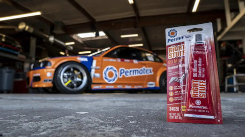 Right Stuff 90 Minute Red High Temperature Gasket Maker For Headers And Exhaust, 3 oz tube in a garage with a race car